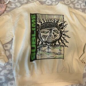 American Eagle Cream Graphic women’s sweater